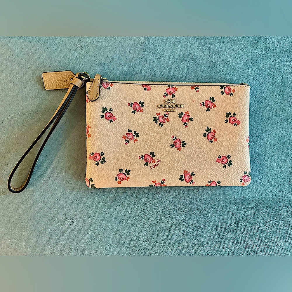 Coach floral pattern wristlet